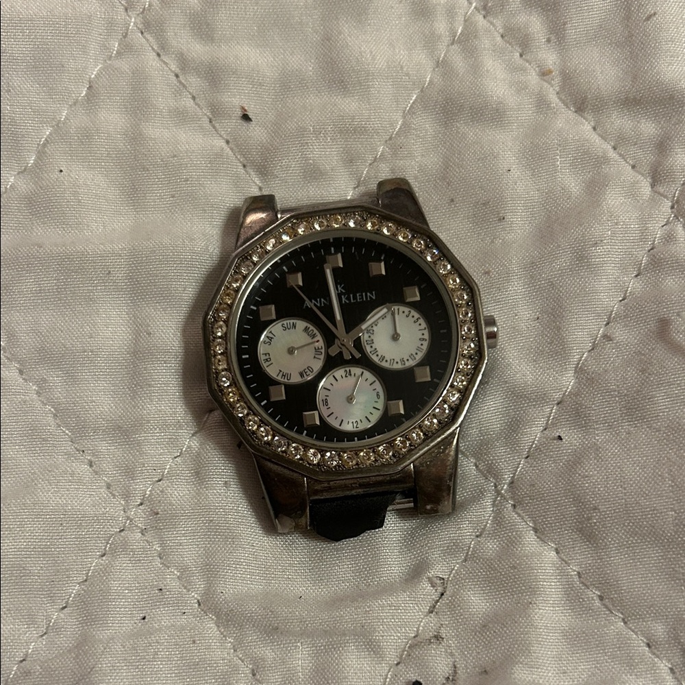Anne Klein Silver and Black‎ Women’s Watch face with Crystal Accents